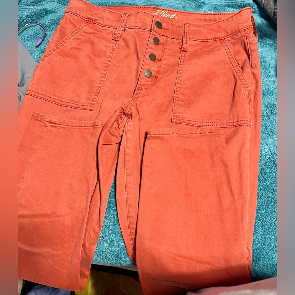 Orange ish pants. Excellent condition. Not super skinny just skinny. No scams